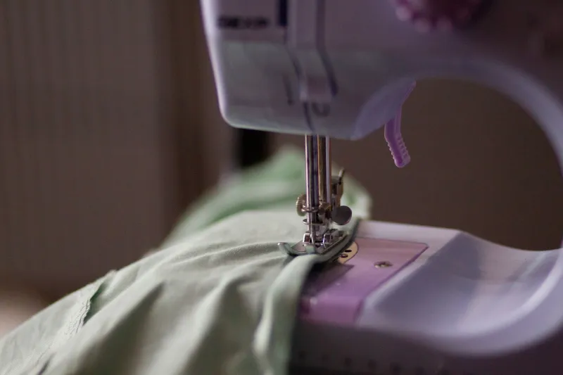 Counting What Holds: The Arithmetic of Stitch Density, Thread Weight, and Seam Longevity
